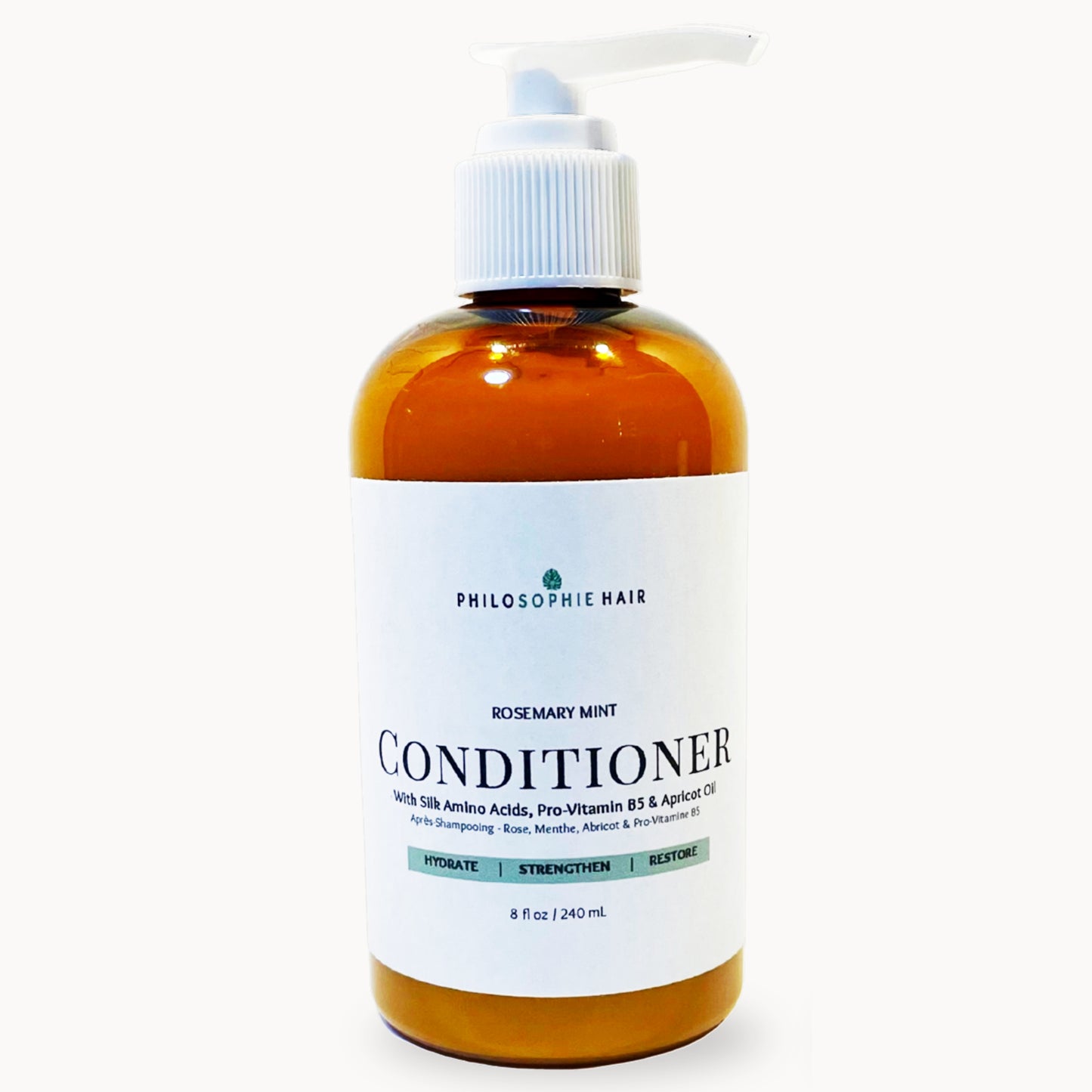 Bottle of Philosophy Hair Rosemary Mint Conditioner on a white background