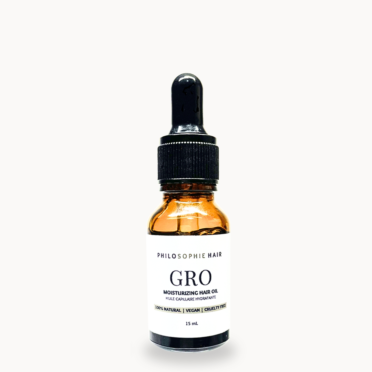 Bottle of Philosophe Hair Gro Moisturizing Hair Oil on a white background