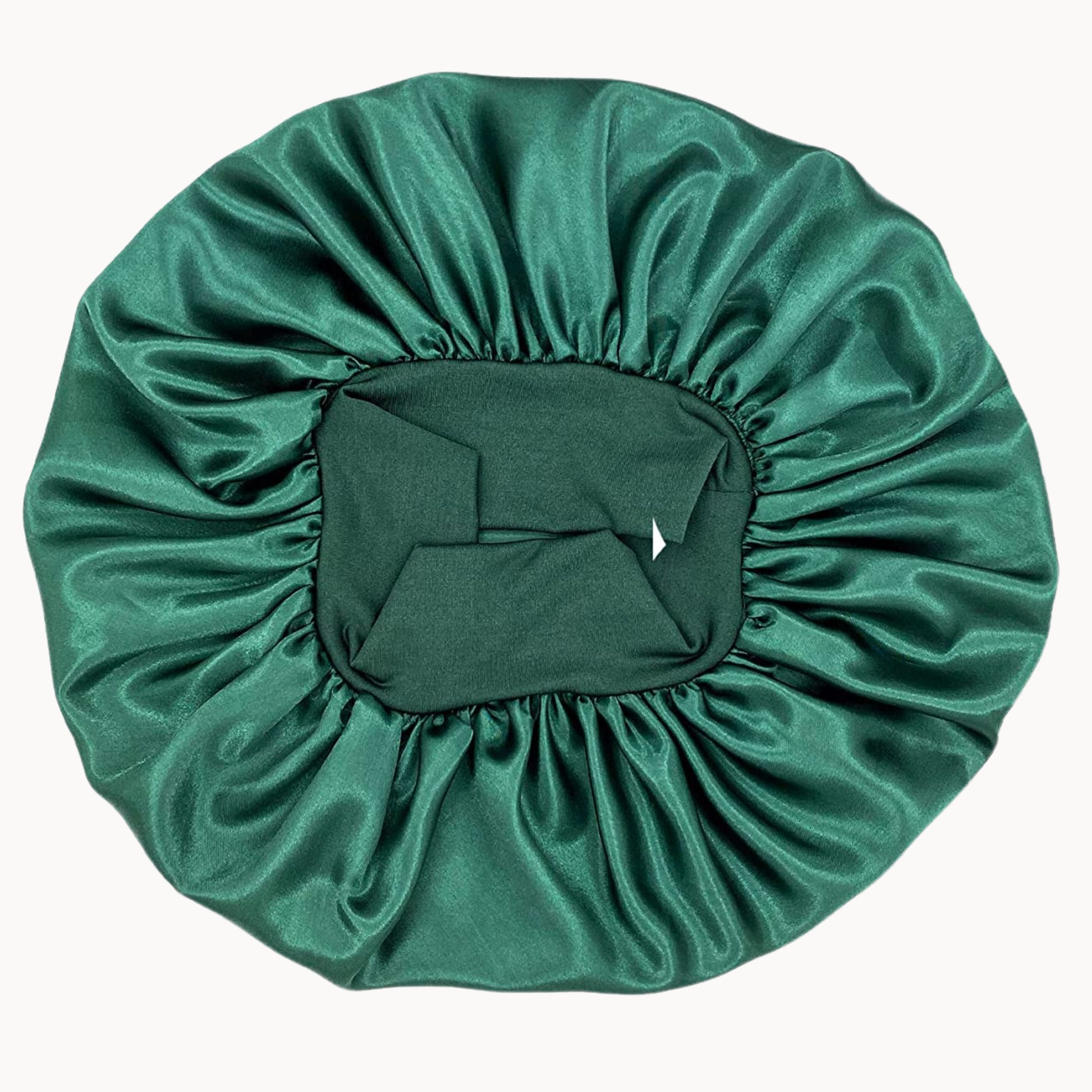Green satin hair bonnet on a white background