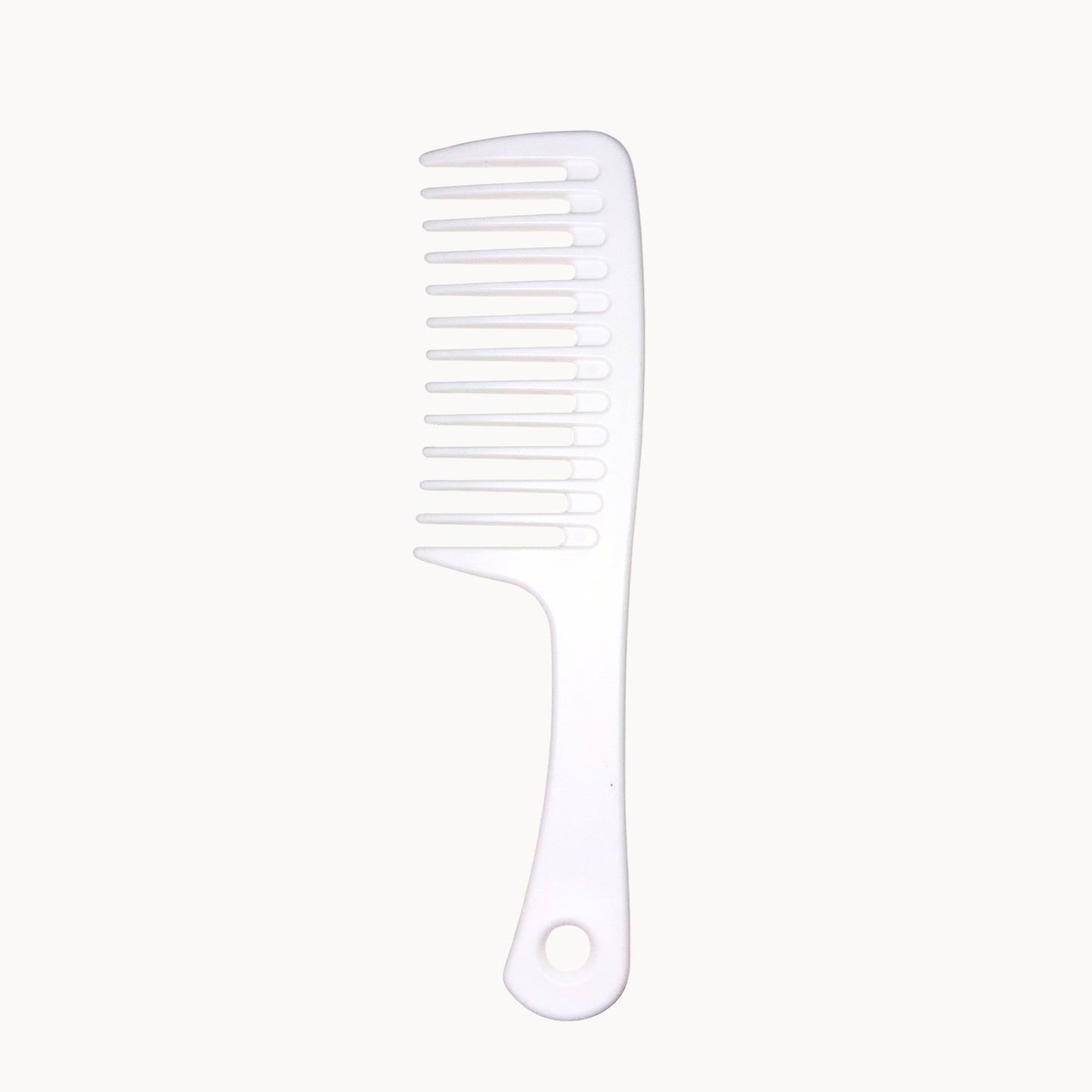 White comb on a white background