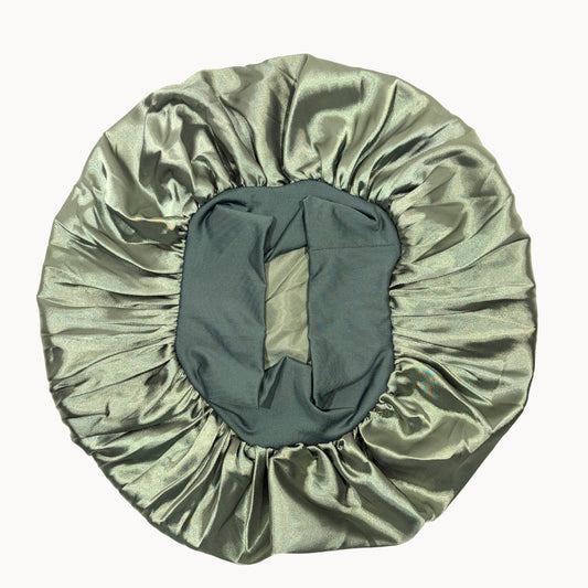 Green satin hair bonnet on a white background