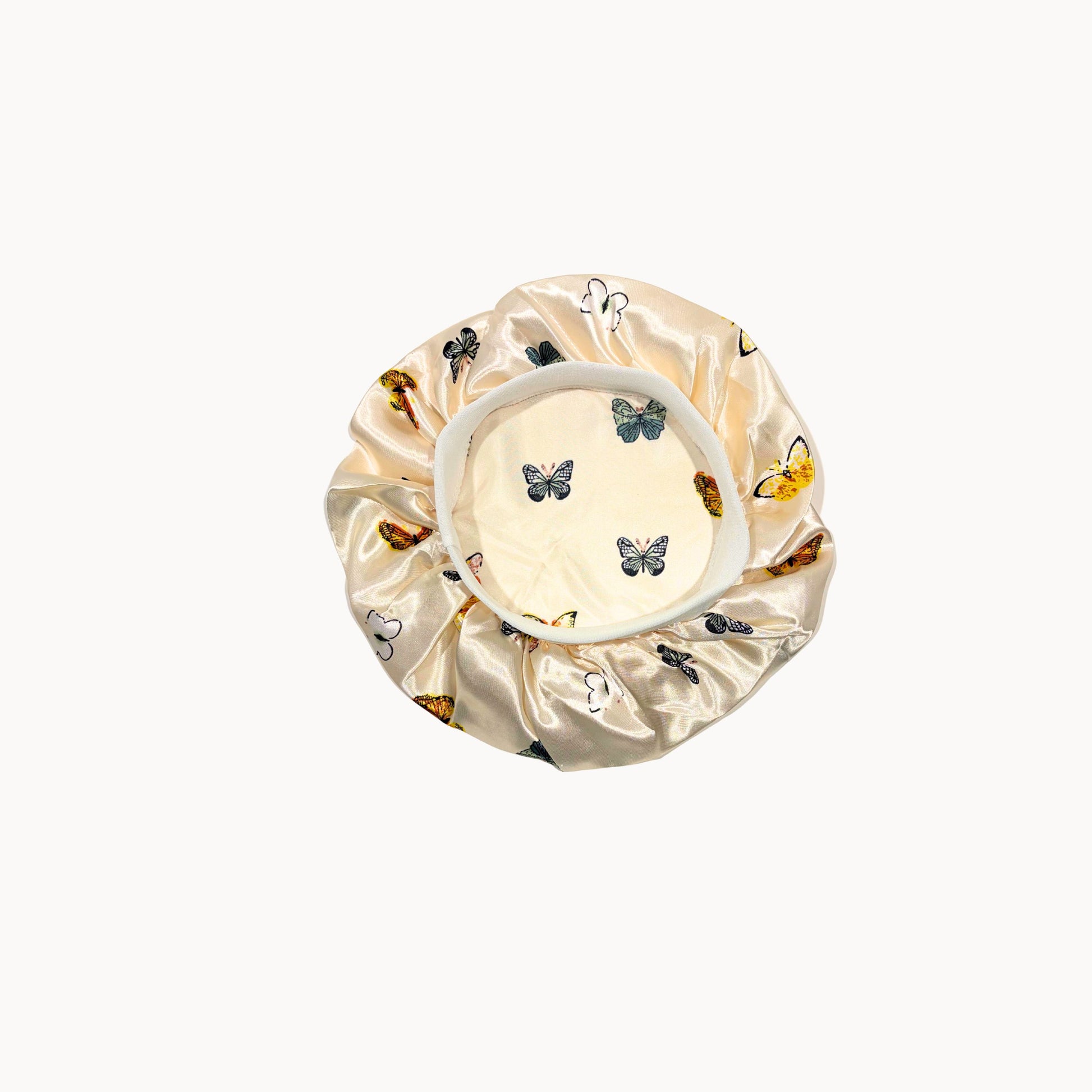 Kiddie Satin  Bonnet with butterfly designs on a white background